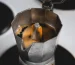 หม้อต้มกาแฟมอคค่าพอตอะลูมิเนียมทรงแปดเหลี่ยมวางบนเตา